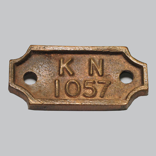 Vintage Number Tag — "KN 1057," Origin Unconfirmed