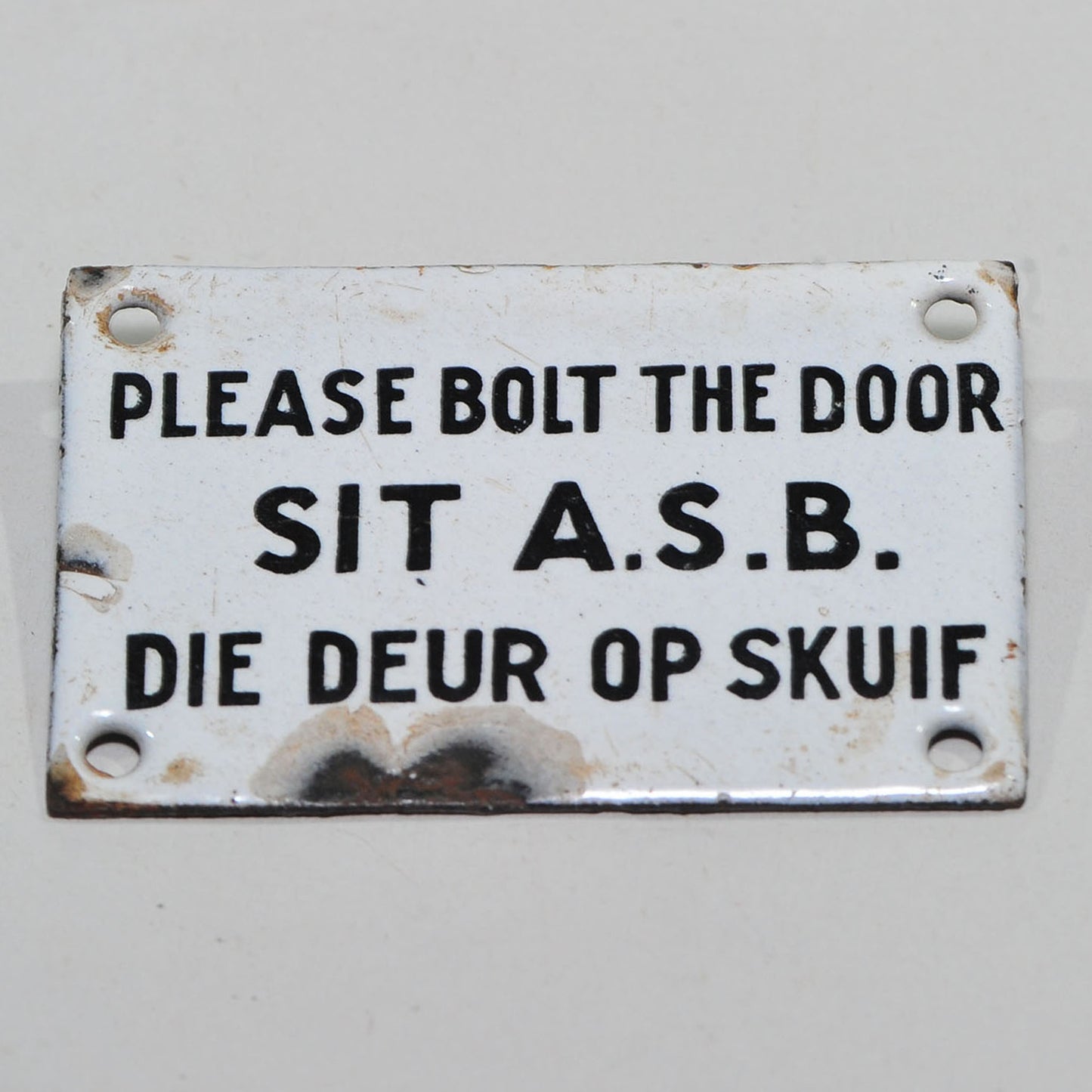 Bilingual Enamel Toilet Door Sign — "Please Bolt the Door / Sit A.S.B. Die Deur Op Skuif"
